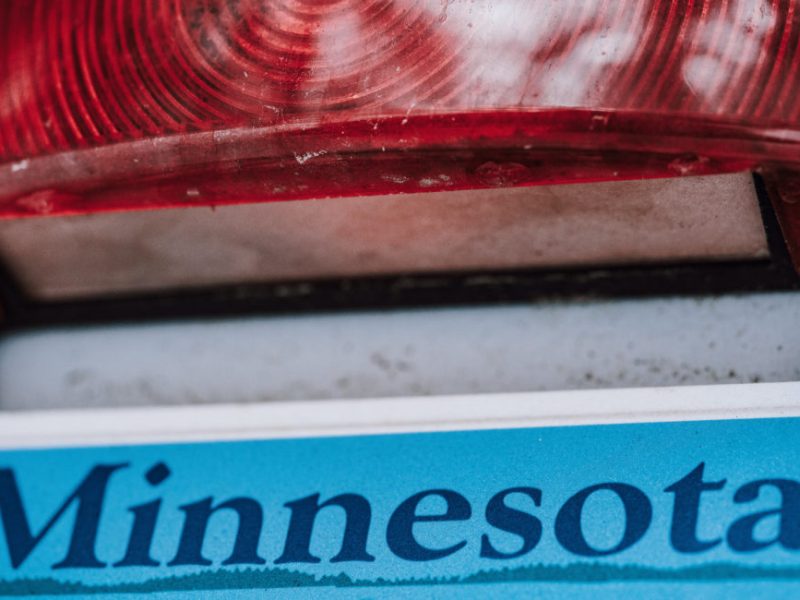 A Minnesota vehicle license tag