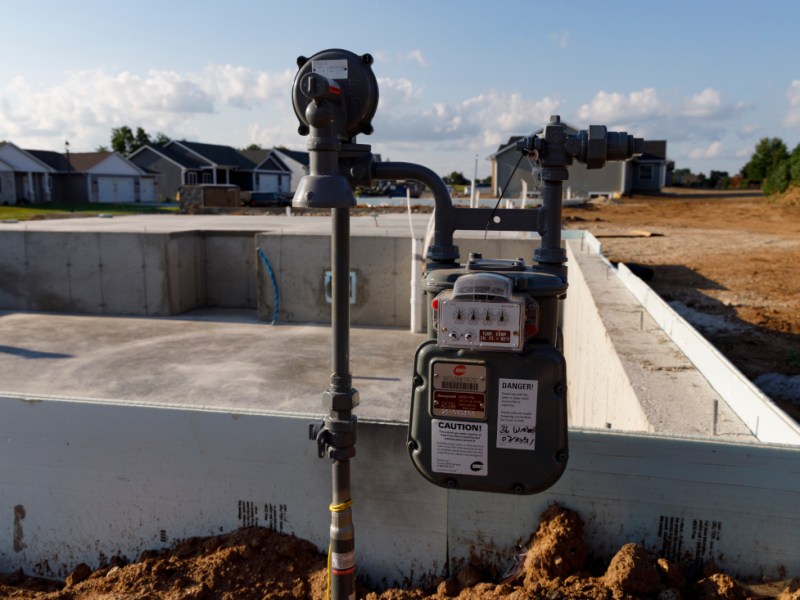 A natural gas meter near the foundation of a new home under contruction.
